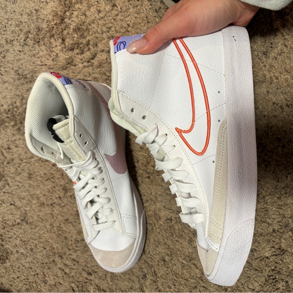 Nike White High-Top Sneakers with Red Swoosh